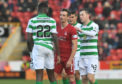 Celtic's Odsonne Edouard, left, exchanges words with Craig Bryson during the Ladbrokes Premiership match between Aberdeen and Celtic.