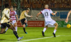 Aberdeen's Lewis Ferguson opens the scoring during a Ladbrokes Premiership match between Hamilton and Aberdeen at the FOY Stadium, on October 30, 2019.