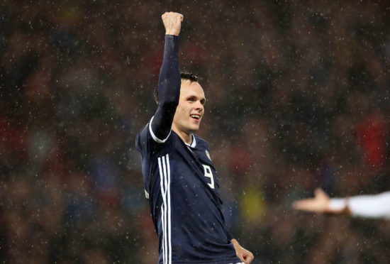 Lawrence Shankland celebrates his debut goal for Scotland last year.