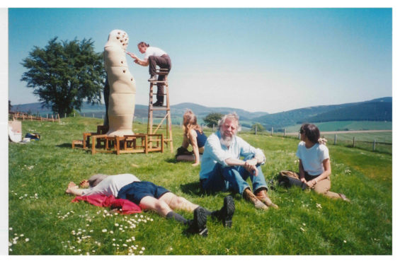 SSW chief technician Peter Smith, centre, with Peter Bevan, on ladder and other artists installing SS08 Granite Granite Carving Symposium (1995). Photo: Scottish Sculpture Workshop