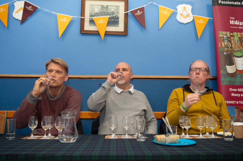 Whisky tasting in a hall near The Whisky Shop in Dufftown, which is part of the inaugural Whisky Colours Festival run by the owner of the shop to encourage visitors to area outside summer months.