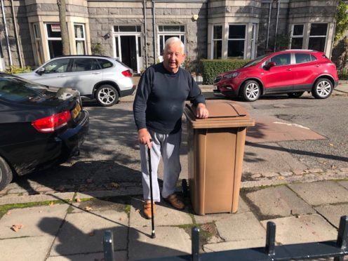 James Ellis and his garden bin.