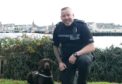 Drugs detection dog 'Bear' and the newly qualified handler, Constable Stuart Wightman