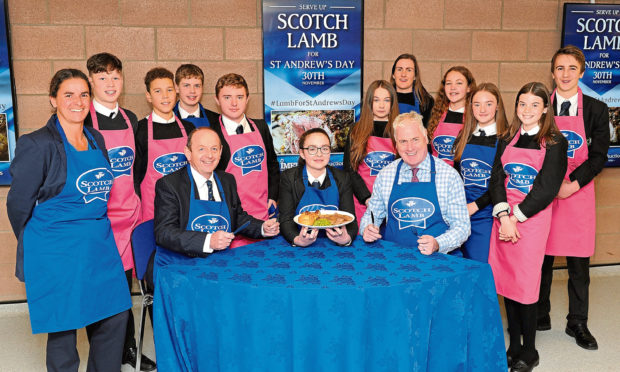 Balfron High School Home Economics pupils get ready to cook for #LambforStAndrewsDay with QMS Chair Kate Rowell (left), George Purves, Managing Director of United Auctions seated with pupil Beth Rodgers and Chief Executive of QMS Alan Clarke.