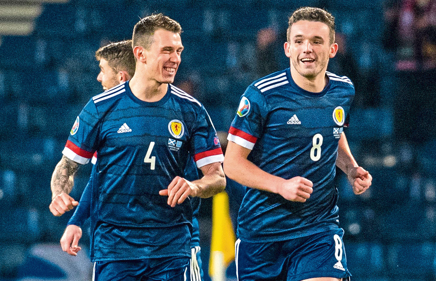 Scotland's John McGinn celebrates with Ryan Jack (left) after he scores a free kick to make it 1-1 during the UEFA European Championship Qualifier between Scotland and Kazakhstan.