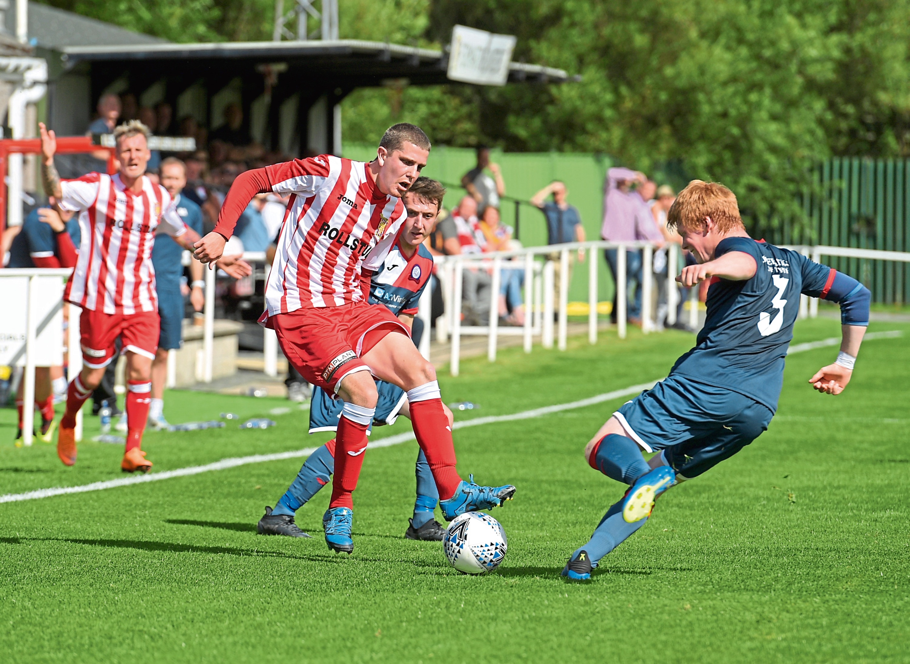 Formartine's Jonathan Crawford and Turriff's Owen Cairns.
Picture by Kath Flannery