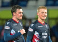 Ross County's Sean Kelly (L) and Tom Grivosti