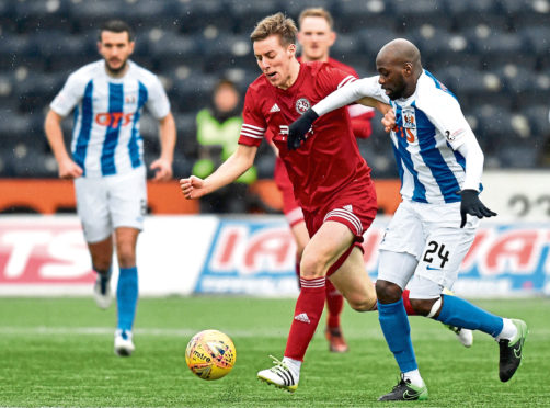 Martin Maclean in action for Brora Rangers against Kilmarnock.