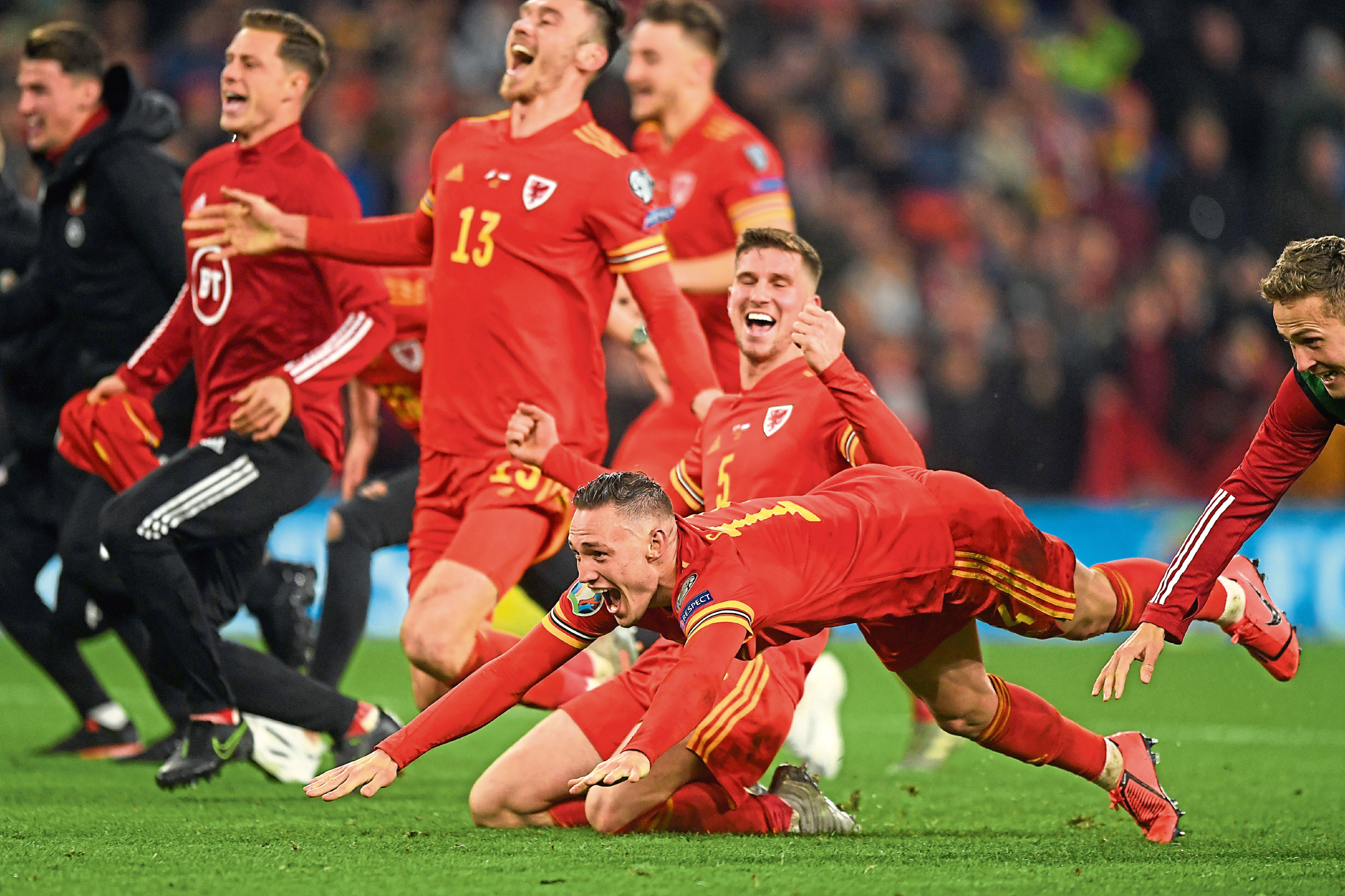 Wales celebrate qualifying for Euro 2020 after their 2-0 win over Hungary.