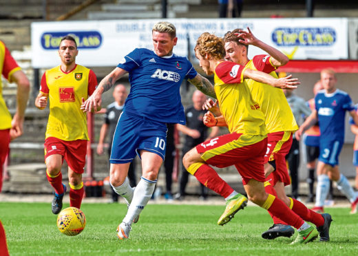 Scott scored four times for Cove.