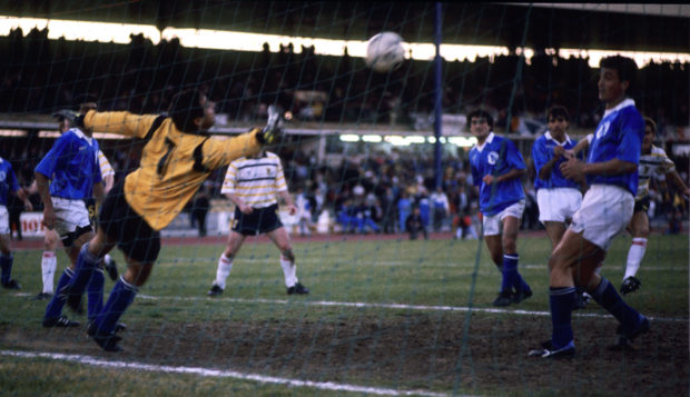 Scotland's Richard Gough (hidden, back right) heads home his side's 89th minute winner.