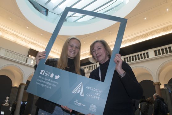 Jennifer Milne  and Christine Rew marking the 10,000th visit