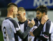 Rabin Omar celebrates with team-mates after scoring his second and Elgin's fourth and final goal.