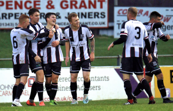 Rory MacEwan celebrates his goal with Elgin City team-mates.