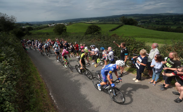 The Peloton takes the first King of the Mountain climb up Bethleham Hill during stage one of the Ovo Energy Tour of Britain 2018 from Pembrey Country Park to Newport.