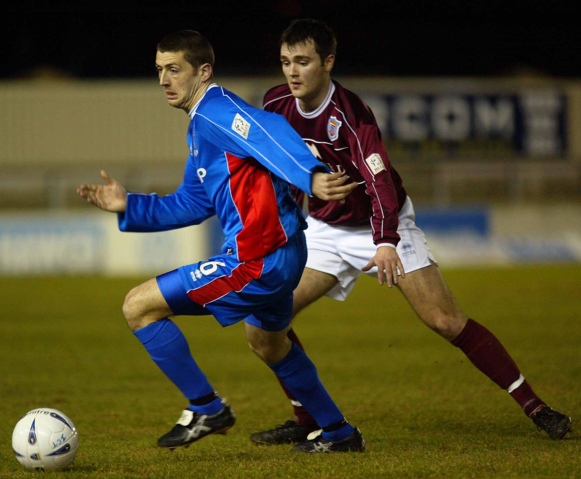 ICT's Roy McBain gets away from Arbroath's Ed Forrest during a league match in the 2002-3 season.