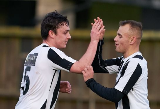 Fraserburgh's Grant Campbell, left, celebrates a goal.