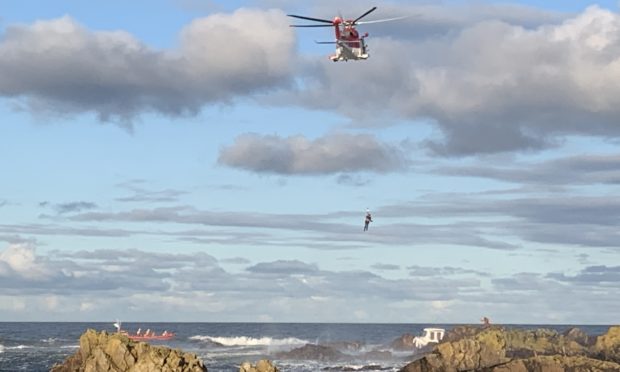 Coastguard helicopter on the scene.