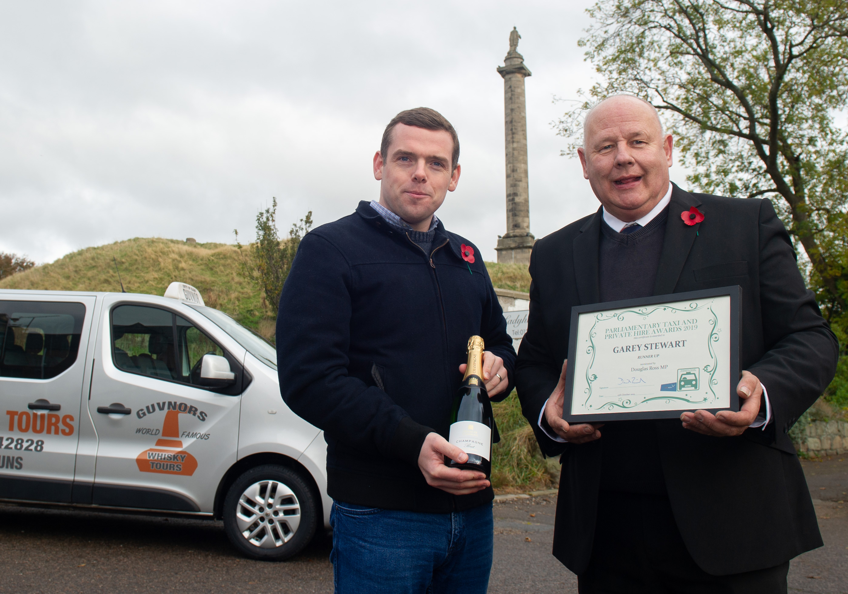 Moray MP Douglas Ross and taxi driver Garey Stewart.