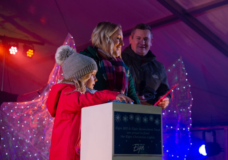 Seven-year-old Sophie Capps switches on the Elgin lights


Pictures by JASON HEDGES