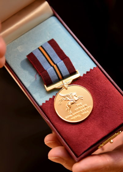 Sandy Cortmann's 50th Anniversary Arnhem medal 

Picture by Paul Glendell