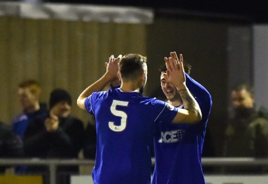 Scott Ross makes it 3-0 to Cove.

Picture by Scott Baxter