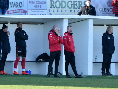 Locos manager Andy Low, centre. 
Picture by Scott Baxter