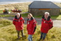 East Sutherland Rescue Association trustees (l-r) Antony Hope, Christine Graham and Alister Scobbie at their current base and on Dornoch Beach. Picture by Sandy McCook