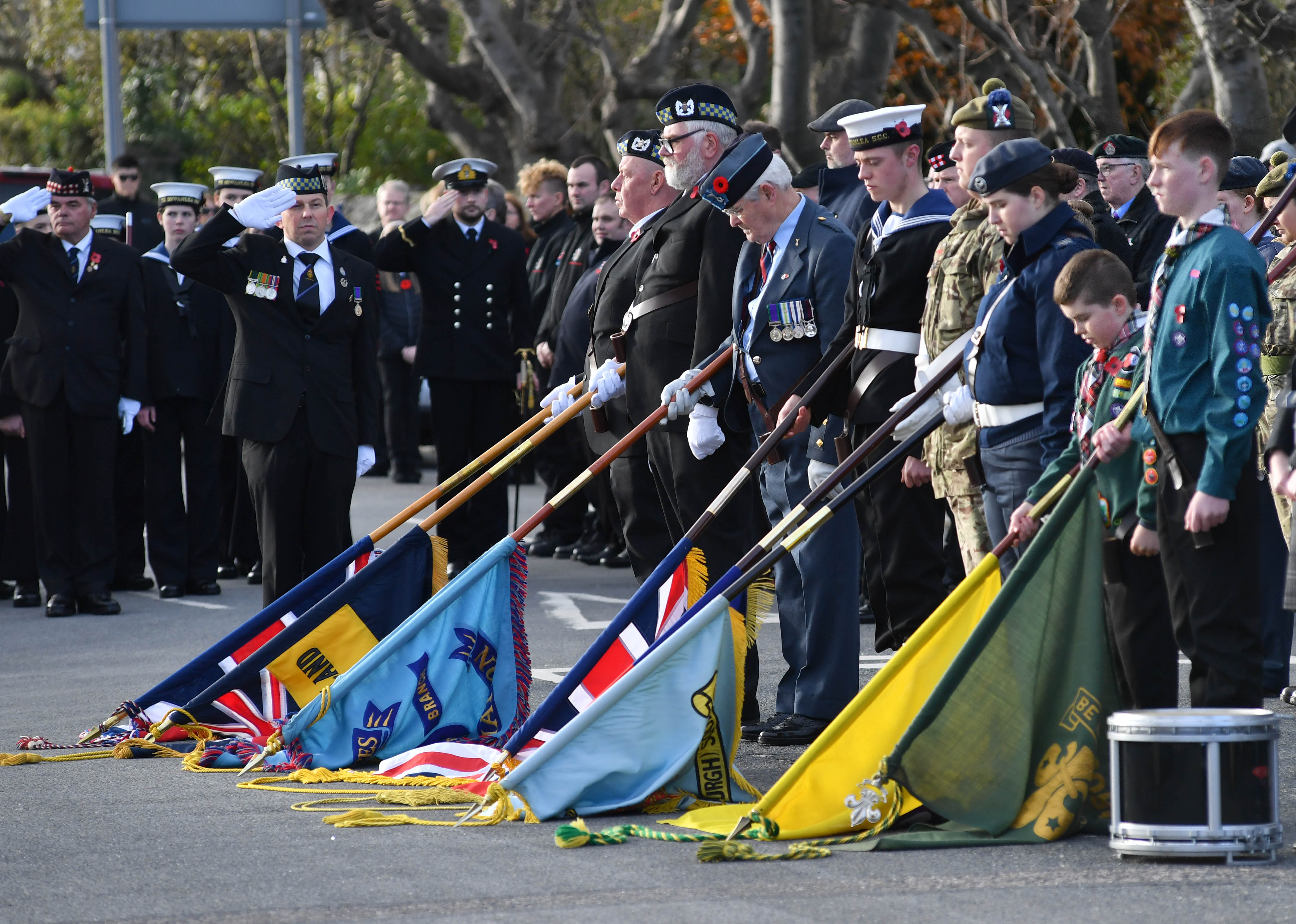 COLOURS ARE LOWERED AT THE BROCH WAR MEMORIAL