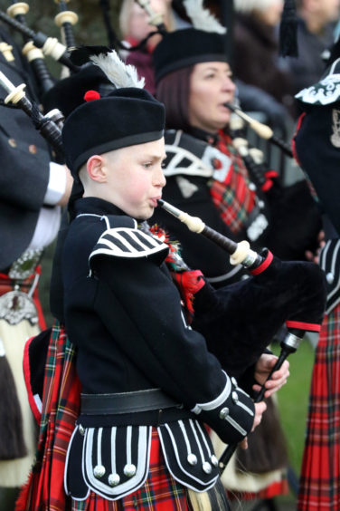 Young member of the Royal British Legion pipe band.