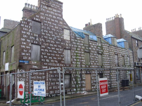 The marked up stonework at the site before it was demolished