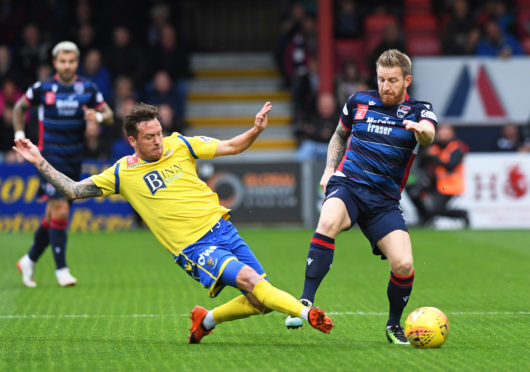 Ross County's Michael Gardyne, right.