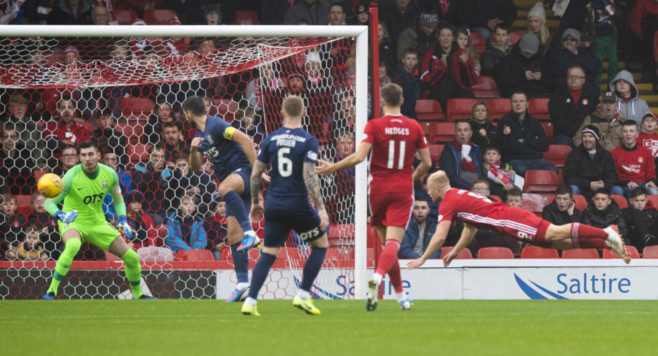 Curtis Main (R) heads home to make it 1-0 to Aberdeen during the Ladbrokes Premiership match between Aberdeen and Kilmarnock