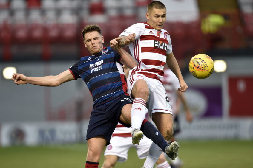 Ross County's Lewis Spence (left) competes with Scott Martin during the Ladbrokes Premiership match between Hamilton and Ross County