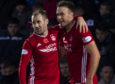 Aberdeen's Andy Considine, right, celebrates his goal at Ross County with Niall McGinn.