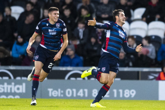 Brian Graham celebrates his opener for Ross County.