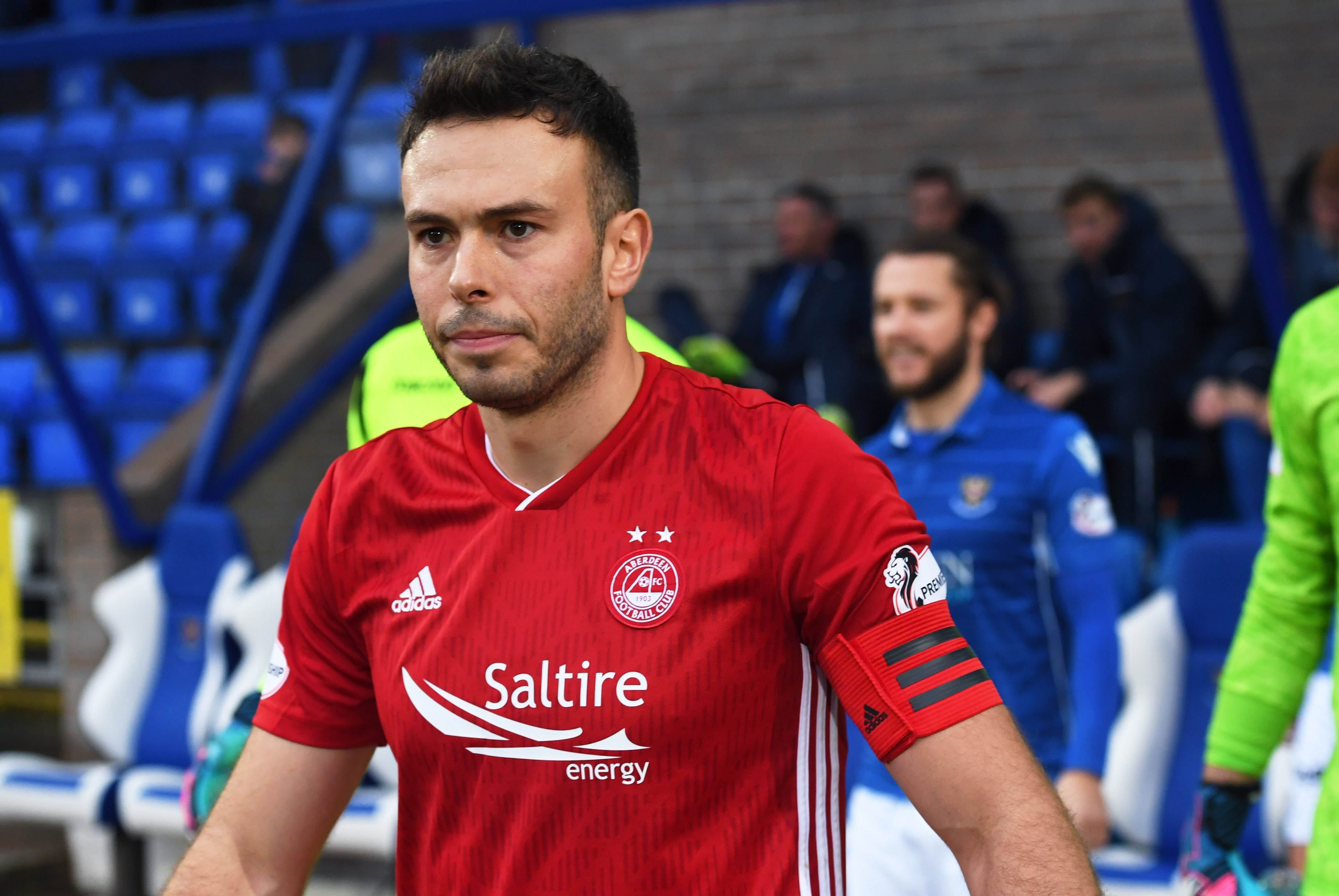Aberdeen's Andrew Considine leads the team out at McDiarmid Park for his 500th club appearance.