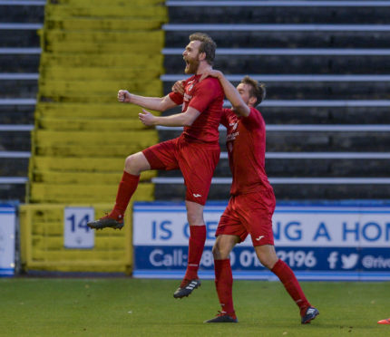 Dale Gillespie celebrates.