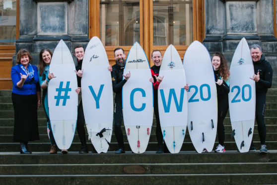 Cabinet Secretary, Fiona Hyslop and surfers Sally Harris, Owen McQueenie, Brian Allen, Sam Christopherson, Tamzin McQueenie and Martin McQueenie