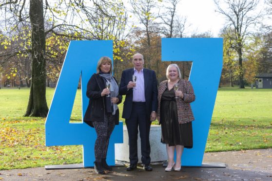 Pictured: local winners Libby Elliot and Fred and Lesley Higgins at a Lottery funded venue to celebrate the number of Lottery millionaires that have been created since it started 25 years ago.