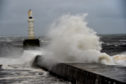 The entrance to Aberdeen Harbour gets pounded with heavy swell and waves.