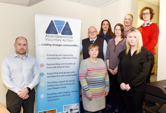 AVA chief executive Dan Shaw (left) and staff (back, from left) Sandra McGuigan, Lorna Sandison, Rhona Davidson. (middle) Keith Anderson, Donna Speed and Isabelle Taylor. (front) Aileen Longino.
Picture by COLIN RENNIE