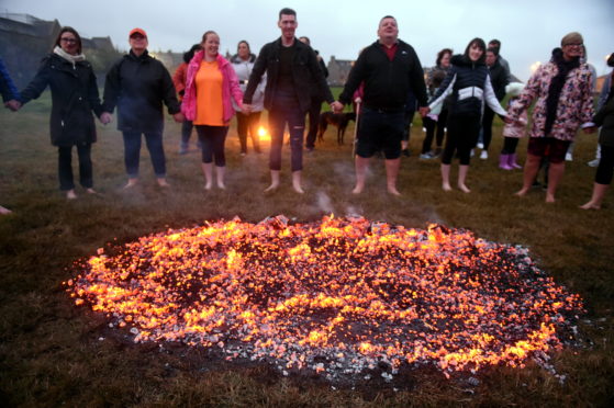Afire walk at Barclay park in aid of Shape Up Peterhead. 

Pictures by Jim Irvine