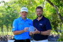 Mark Aspland, Head of Staysure Tour presents the John Jacobs Trophy to Paul Lawrie of Scotland after the final round of the MCB Tour Championship - Mauritius.
