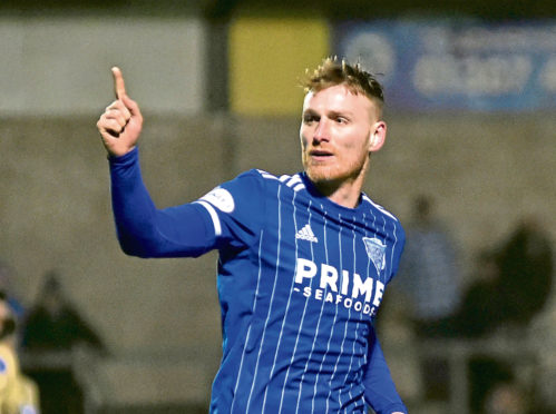 PETERHEAD'S RORY MCALLISTER CELEBRATES  HIS GOAL