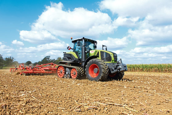 Terra Trac assemblies on the Claas Axion 900 have a larger diameter drive wheel, full suspension and can pivot individually over an undulating surface.