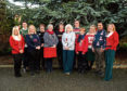 Nina Clancy (on the right) and the RSABI team in Christmas jumpers.