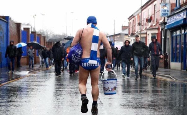 Scouser Michael Cullen, better known as Speedo Mick, is walking John O'Groats to Lands End in aid of disadvantaged youths.