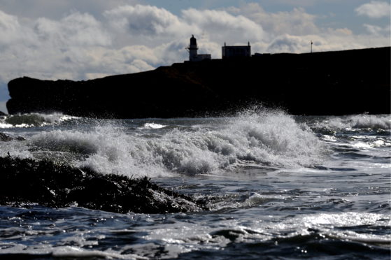 Todhead Lighthouse seen over Catterline Bay
Picture by Chris Sumner.