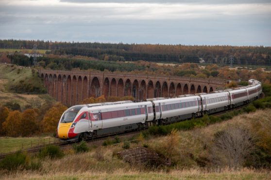 The Azuma service crossing the Culloden Viaduct.